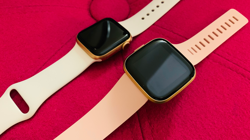 Which one is the Versa 2 and which one is the Apple Watch? From a distance, you could easily mistake one for the other.